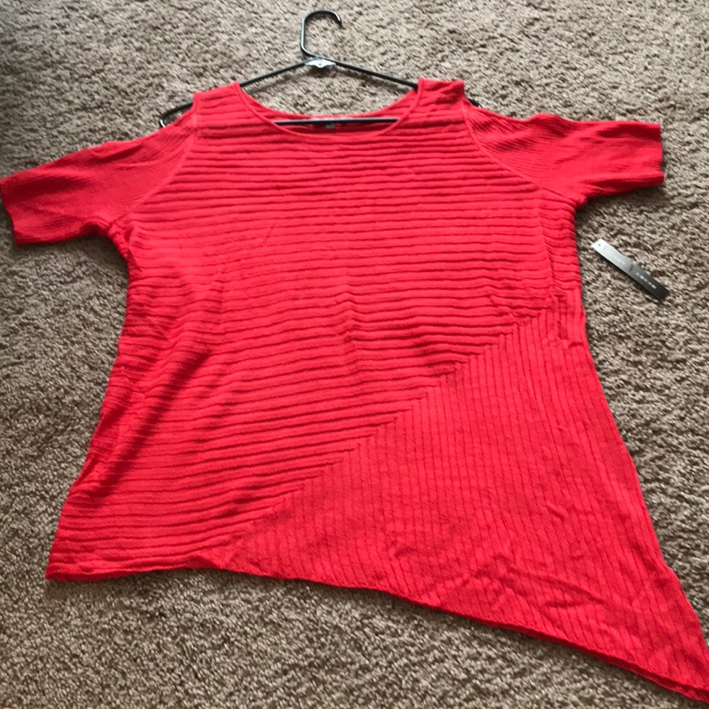 Brand new asymmetrical cut out sweater top